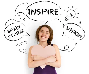 Smiling woman holding heart with thought bubbles reading "Inspire," "Brainstorm," and "Vision" surrounded by lightbulb and stars